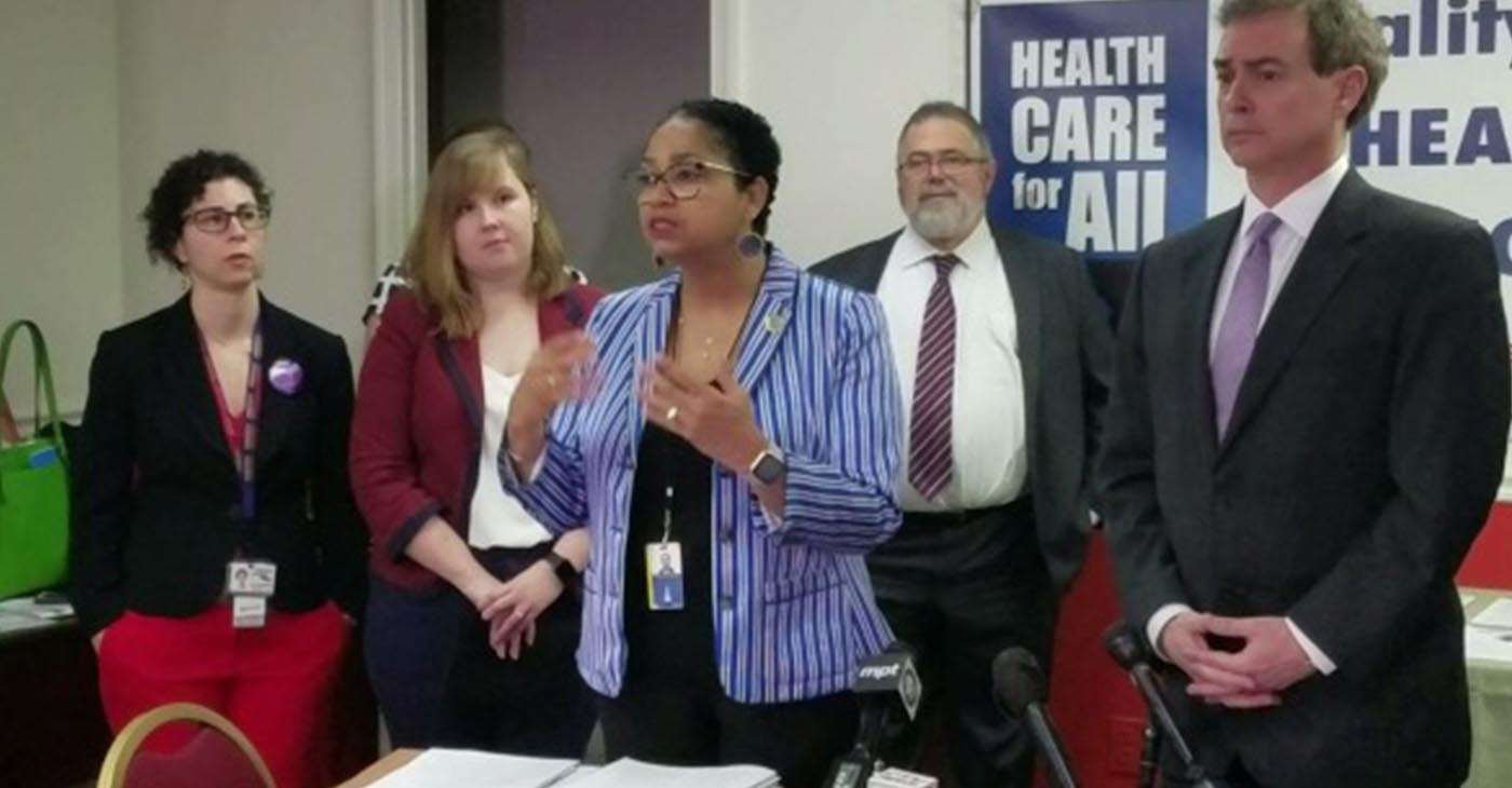 Maryland Delegate Joseline Peña-Melnyk speaks at a Feb. 13 press conference about legislation she and state Sen. Brian Feldman (right) propose to give the state an individual health care mandate. (Photo by: William J. Ford/The Washington Informer)