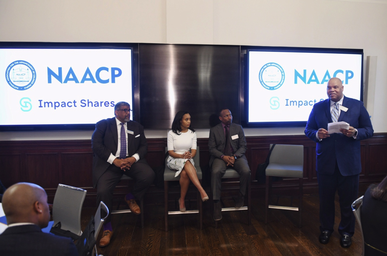 Equity Panel Discussion 2 — NAACP Historic Wall Street Bell Ringing Panel Discussion “Using Capital Markets to Create Social Equity.” Jim Casselberry, CIO of the Sarowitz Family LLC, former stock trader for Rosenblatt Securities Lauren Simmons, who made history as the youngest and only full time female NYSE trader, Guaylon Arnic, Co-Portfolio Manager at Profit Investment Management and Moderator Reggie Browne, Managing Director at Cantor Fitzgerald & Co (standing). (Photo Credit: Justin Knight)