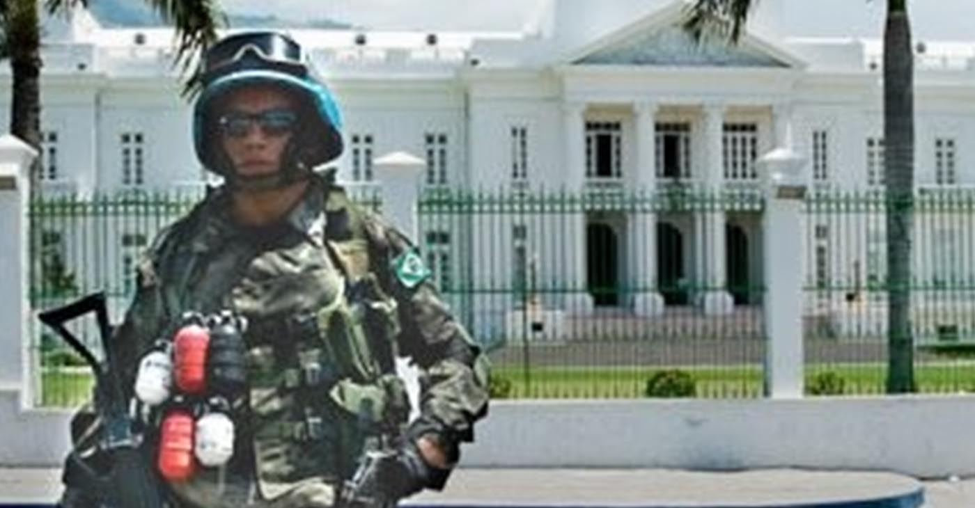U.N. soldier in front of Haiti White House (Photo by: Global Information Network)