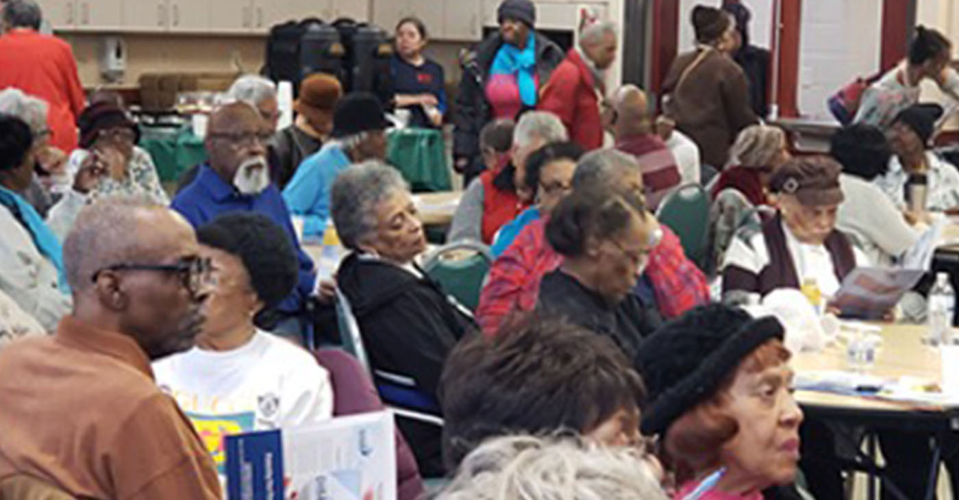 Attendees listen during a forum for senior citizens sponsored by the D.C. Department of Insurance, Securities and Banking at the Hattie Holmes Wellness Center in northwest D.C. on Feb. 7. (Courtesy of DISB)