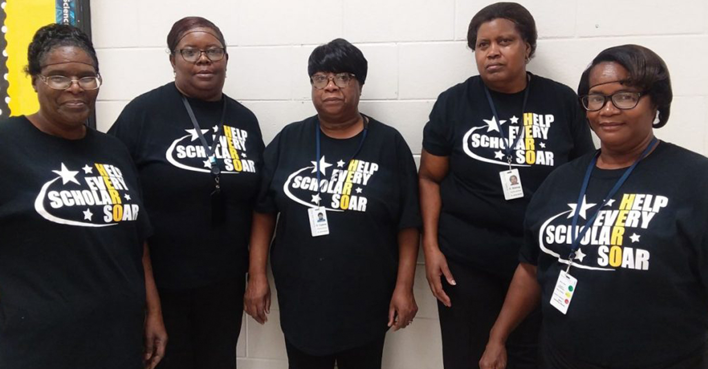Everyone from the bus drivers to the front desk staff, to the cafeteria staff wears their HERO shirt.