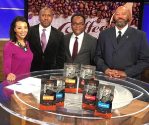 Childhood Friends and Historic Noir Coffee Group owners Christopher Brown (l), Deron Moreman (c) and Ricardo Richardson (r) are interviewed by CBS 46's Trayce Hutchinson. (Photo Credit: Christopher Brown)