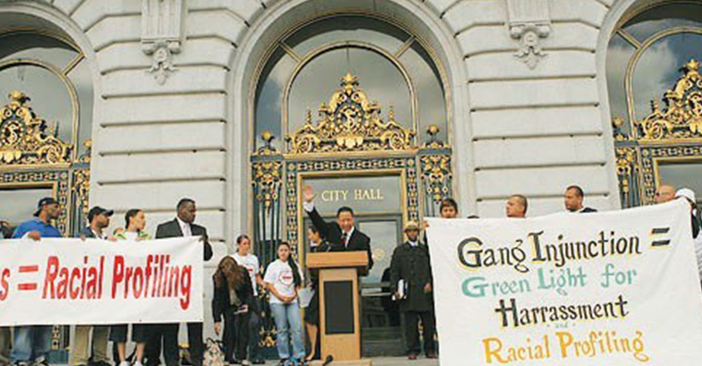 A fierce fighter for youth, Public Defender Jeff Adachi rails against gang injunctions, a civil penalty applied mainly in public housing developments that drive from their homes and families young men reputed to be involved in a gang. Here he speaks at a rally in front of City Hall on July 12, 2007. In poor neighborhoods, Jeff Adachi had more credibility than any other public official and would often be sought out to speak on issues too hot for others to handle. – Photo: John Han, Fog City Journal