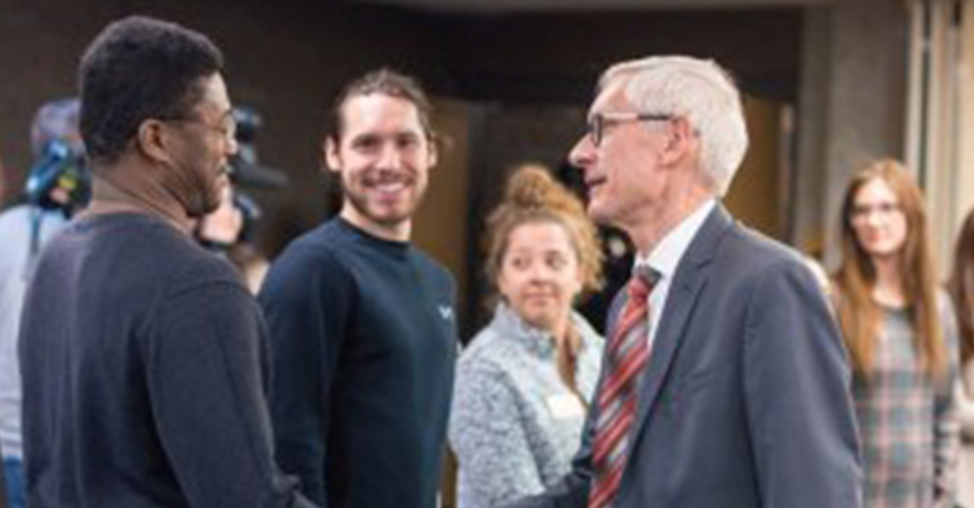 Gov. Tony Evers made sure to say hello to everyone in the room. (Picture taken from UWM by Elora Hennessy)
