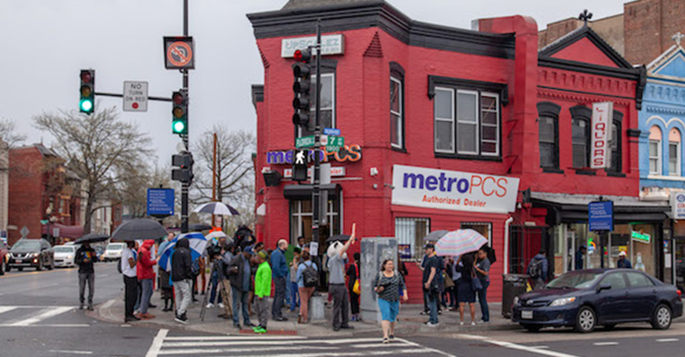 A crowd gathers at MetroPCS on 7th and U streets in northwest D.C. during a protest of a threat from the company's corporate office to shutter the store if the music doesn't stop. (Photo by: Ja’Mon Jackson | WI Bridge)