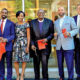 THE PARTNERSHIP—Those involved in the Miller Street development include state Rep. Jake Wheatley, Derrick and Nykia Tillman, Bishop James M. Foster, Pittsburgh Councilman R. Daniel Lavelle, Bob Meeder and Lisa Kelly. (Photo by Emmai Alaquiva)