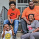 Janel Turner, (bottom right), her husband, and two of her sons, at their home in Philadelphia’s Nicetown neighborhood. (Kimberly Paynter/WHYY)