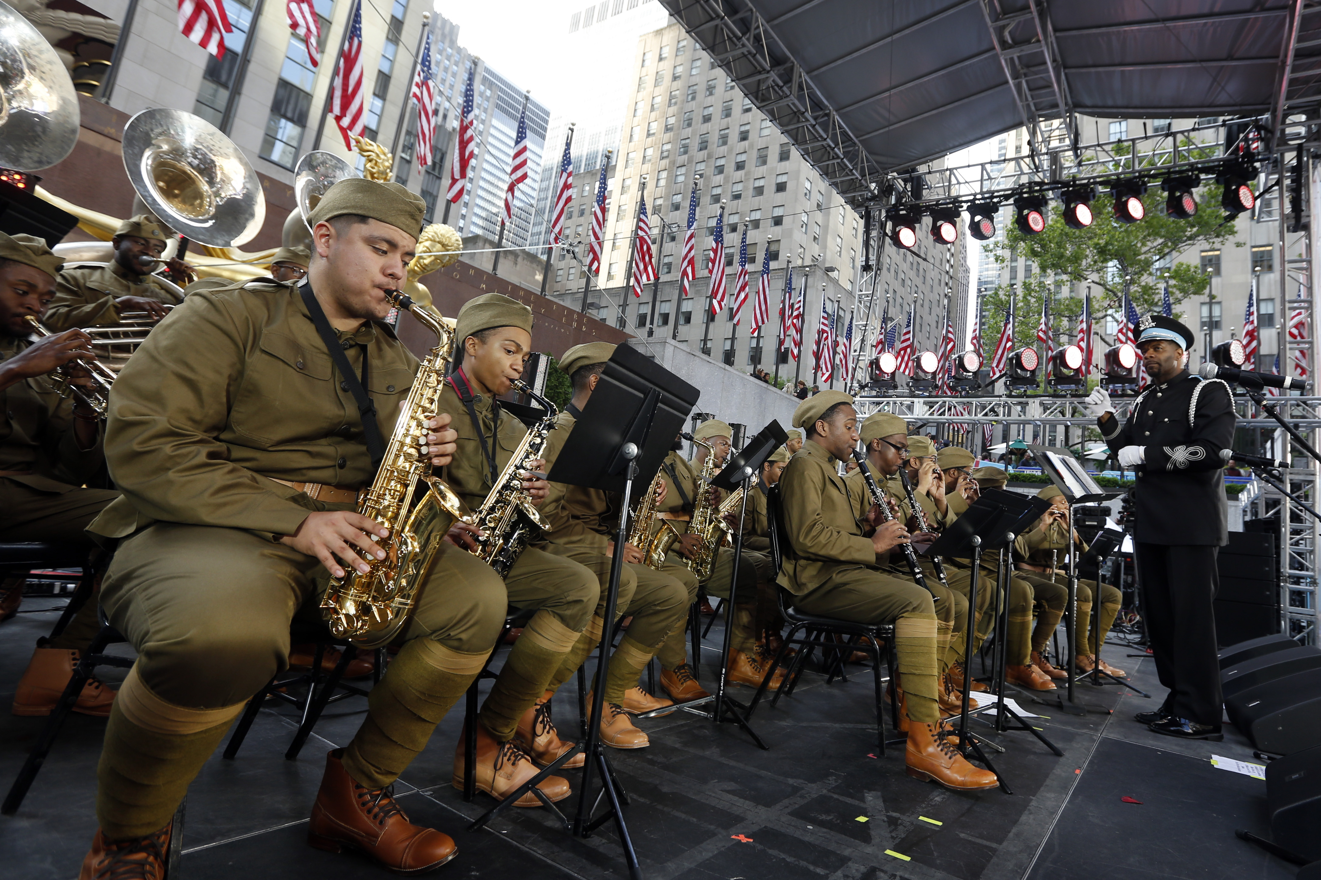 The 369th Experience, a WWI tribute band sponsored by the U.S WWI Centennial Commission, performs in Rockefeller Center during Fleet Week New York, which this year is commemorating WWI, Saturday, May 25, 2019, in New York. The band, which is made up of music students from Historically Black Colleges and Universities across the U.S., play the musical repertoire of New York's legendary 369th Regiment "Harlem Hellfighters" Regimental Jazz Band. (Jason DeCrow/AP Images for U.S. WWI Centennial Commission)
