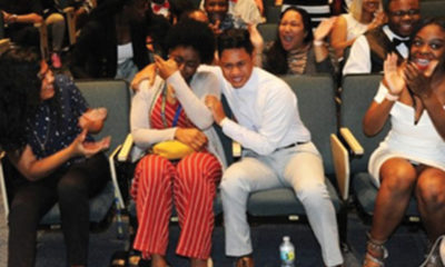 Janiyah Kennedy (L) and Alexander Castillo (R) break into tears as they learn that they have both been awarded a four-year, fully paid scholarship — each valued up to $30,000— from the Biscayne Bay Kiwanis Club.