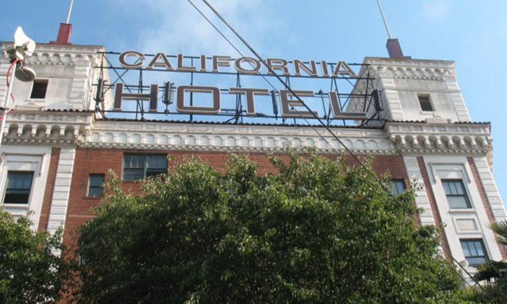 Community elders tell many stories about parties held at the once lavish landmark, the California Hotel, which is now affordable housing for 72 residents. The property owner stopped renting out new units last year and is now trying to intimidate those remaining into abandoning their homes even though no other affordable housing can be found in Oakland.