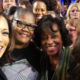 Melanie Campbell (second from left) poses with Sen. and 2020 Democratic presidential hopeful Kamala Harris and others after the second Democratic presidential debate in Miami on June 27. (Courtesy of Melanie Campbell)