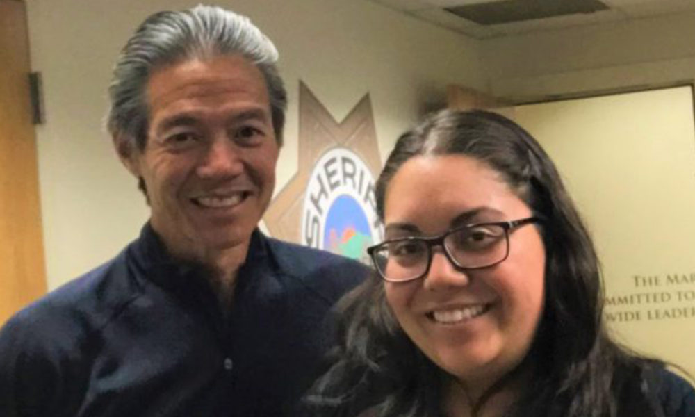 America Velasco (right) of the Sheriff’s Office and Elmer Jan of the Marin County Free Library have teamed up to expand library selections for jail inmates.