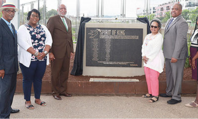 The Port Authority rededicated the Spirit of King plaque near the East Liberty Busway, June 19. Pictured are Edward Greene, Ashley Johnson, Malik Bankston, Gwendolyn Allen, Eric Wells, and Evelyn Newsome. (Photo by J.L. Martello)