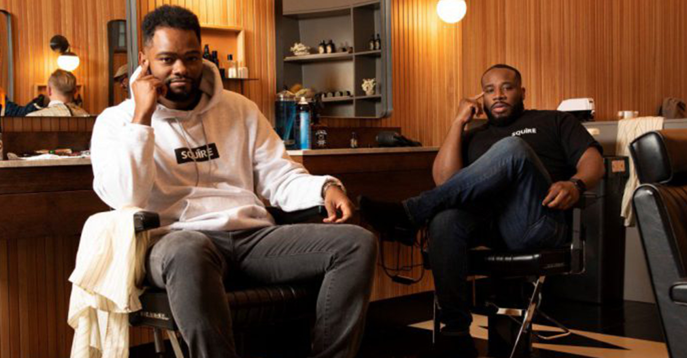 Songe La Ron (left) and Dave Salvant at a barber shop. (Twitter photo)