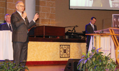 Mayor David Briley speaking at The State of Black Nashville forum held at Cathedral of Praise. Briley is joined on stage by his opponents, (l-r) Councilman John Cooper, Representative John Ray Clemmons, and Dr. Carol Swain.