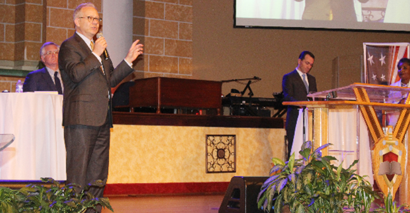 Mayor David Briley speaking at The State of Black Nashville forum held at Cathedral of Praise. Briley is joined on stage by his opponents, (l-r) Councilman John Cooper, Representative John Ray Clemmons, and Dr. Carol Swain.