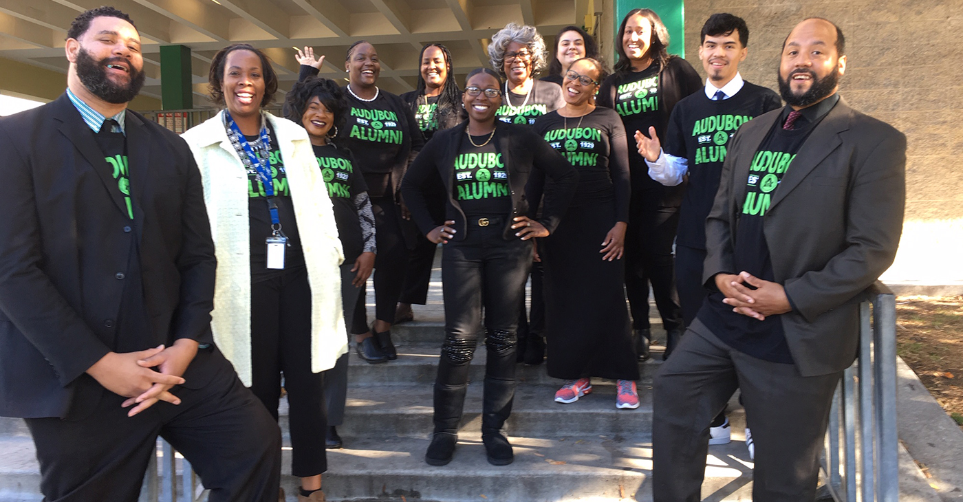 The Audubon Middle School staff includes alumni, from left, Marcus Mason, Jakesha Williams-Watson, Yolanda Vance, Alexis Flenori, Dorlisa Shumate, Kafayat Tijani, Olivia Fields, Aide Ramirez, Pamela Jones, Typhanie Willock-Bogard, Frank Vargas and Raymond Duronslet. (Cora J. Fossett/L.A. Sentinel)