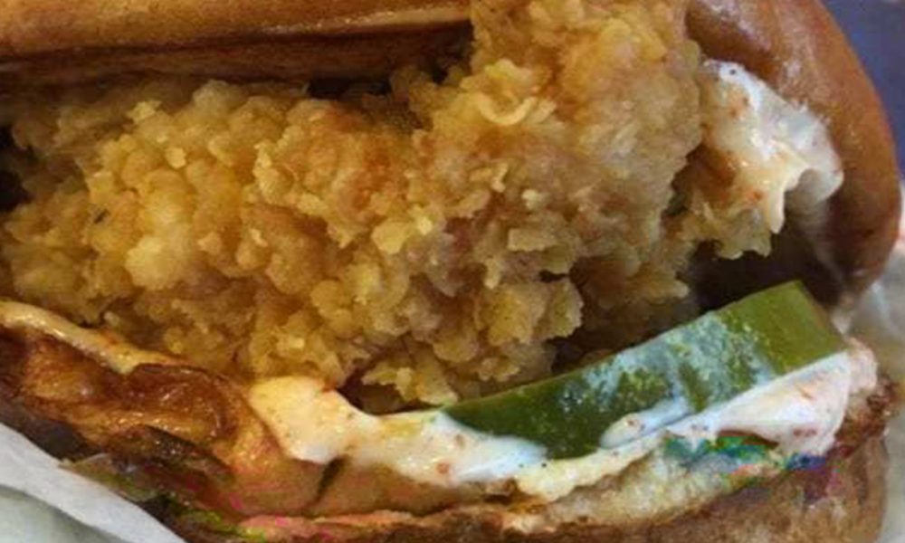 TSDs Lee Eric Smith took a "sandwich selfie" before sampling the Spicy Chicken Sandwich from Popeyes. (Photo by: Lee Eric Smith)