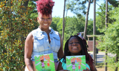 Dee (left) and Aubrey Edwards with their book "We Are Different & We Are Beautiful" (Ameera Steward, The Birmingham Times)
