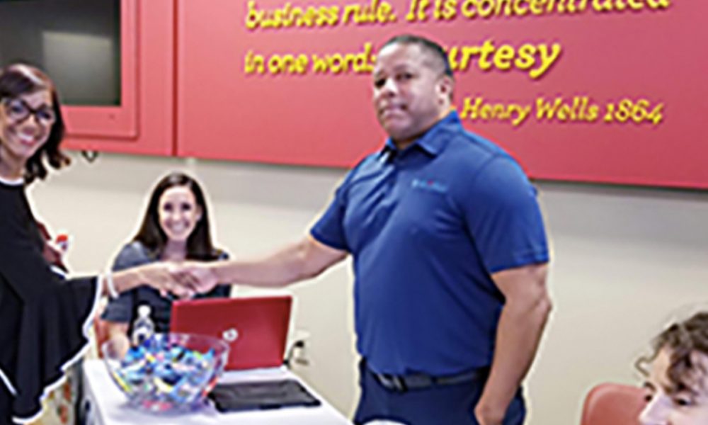 Shown is job fair attendee Lisa Ruiz with job fair vendor Jesus Garay, CEO Global Freight and Commerce Company (Photo by: jacksonvillefreepress.com)