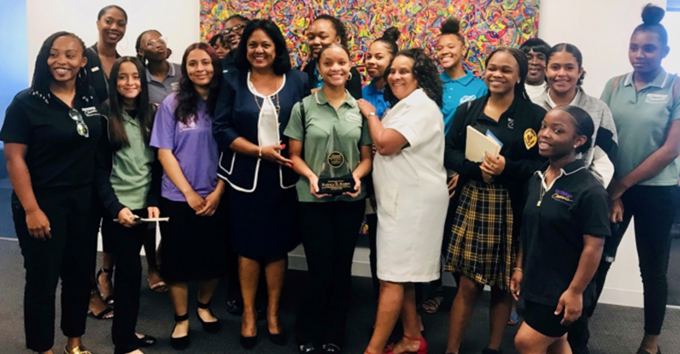 Kamala Harris’ State Director Heather and Brotherhood Crusade president Charisse Bremond with the young ladies as they tour the office.