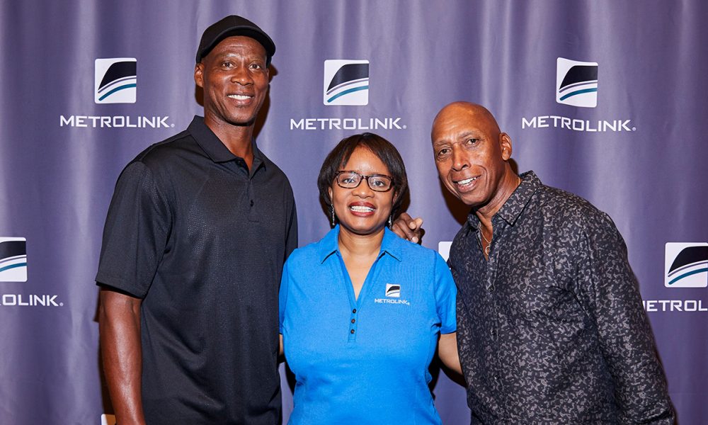 CEO Stephanie Wiggins, center, poses with Byron Scott, left, and Jeffrey Osborne, who serve as guest conductors on the Metrolink rail system. (Photo by: Jose Ubeda | Metrolink)