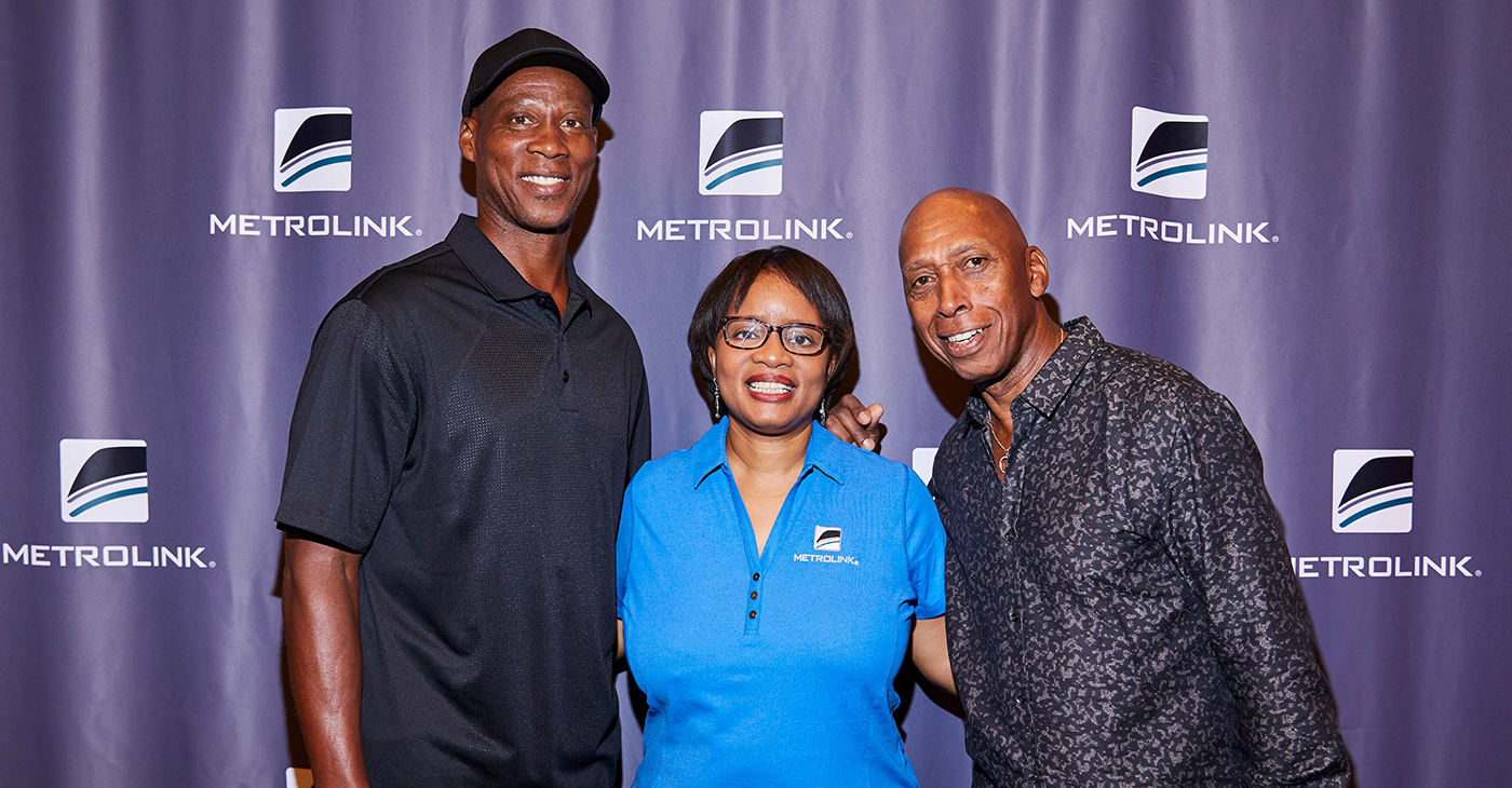 CEO Stephanie Wiggins, center, poses with Byron Scott, left, and Jeffrey Osborne, who serve as guest conductors on the Metrolink rail system. (Photo by: Jose Ubeda | Metrolink)