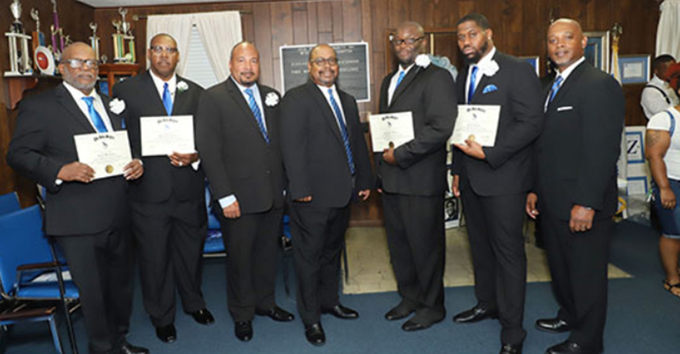 Left to right: Taylor Washington (Inductee), Marcus Conley (Inductee), Ruben Grant (Florida State Director), Will Evans (President-Nu Beta Sigma Chapter), Randy Sewell (Inductee), Joshua Rogers (Inductee) and Jason Edgar (Southern Regional Social Action Director) (Photo by: Ron Lott)