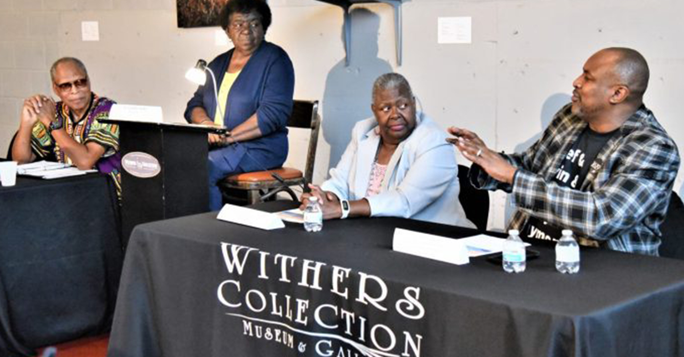 Moderated by Dr. Cynthia Sadler (standing), ‘Talk About It Tuesday” featured panelists (l-r) John Ashworth of the Lynching Sites Project; Teresa Mays of the Afro-American Genealogical Society; and Dr. Andre Johnson of the University of Memphis. (Photo by: Gary S. Whitlow | GSW Enterprises)