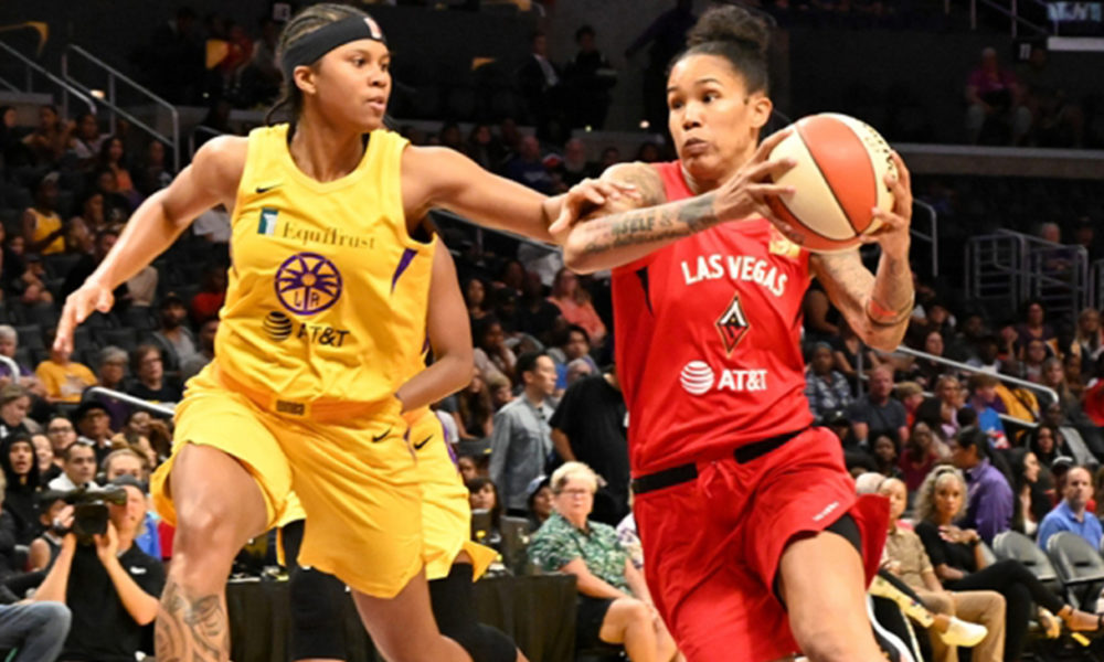 L.A. Sparks forward Tierra Ruffin-Pratt defends Las Vegas Aces forward Tamera Young (Photo by: Emarie Marie/T.G.Sportstv1)