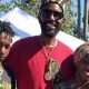 Cozmo-El, with his wife Akilah Moor-El, holding daughter Kaliyah and Saleem at the Jack London Square farmer's market last Sunday. (Photo by: postnewsgroup.com)