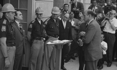 Attempting to block integration at the University of Alabama, Governor George Wallace stands defiantly at the door while being confronted by Deputy U.S. Attorney General Nicholas Katzenbach. (Photo: Warren K. Leffler, U.S. News & World Report Magazine [Public domain]/Wikimedia Commons)
