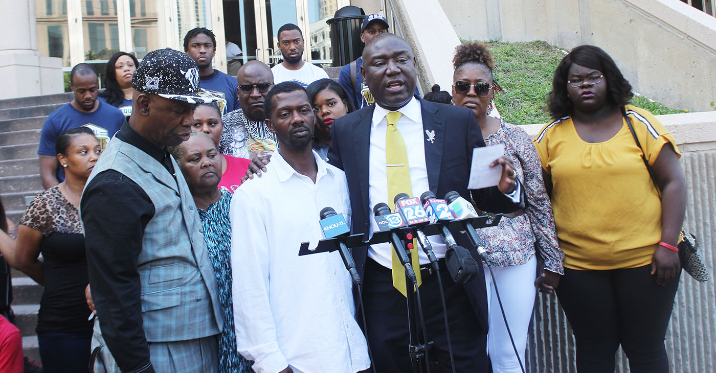 Civil Rights Attorney Benjamin Crump and Baytown, Texas beating victim Kedrick Crawford at press conference held at Harris County Civil Courthouse in Houston, Texas.