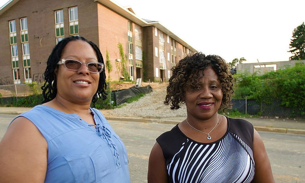 Cynthia Eaglin and Rufaro Jenkins in front of their former home at Parkway Overlook Apartments in Washington, D.C.