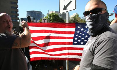 Austin, Texas, USA - November 19, 2016: 'White Lives Matter' demonstrators display an American flag at a protest just south of the Capitol grounds. The 'White Lives Matter' demonstrators, numbering about 20 people at the most, came from Houston with the message that the hate crime law is unfair to white people. (Photo: iStockphoto / NNPA)