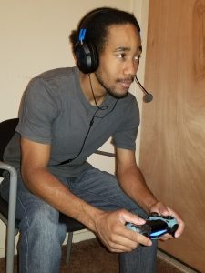 Ralphael Burks streams games on his Youtube channel, AnimexGames. Gaming is an escape from reality and allows him to experience a new world through video games. (Photo: Destiny Royston)