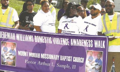 Pastor Arthur L. Sample III and First Lady Barbara (center) led the march through the surrounding neighborhood.
