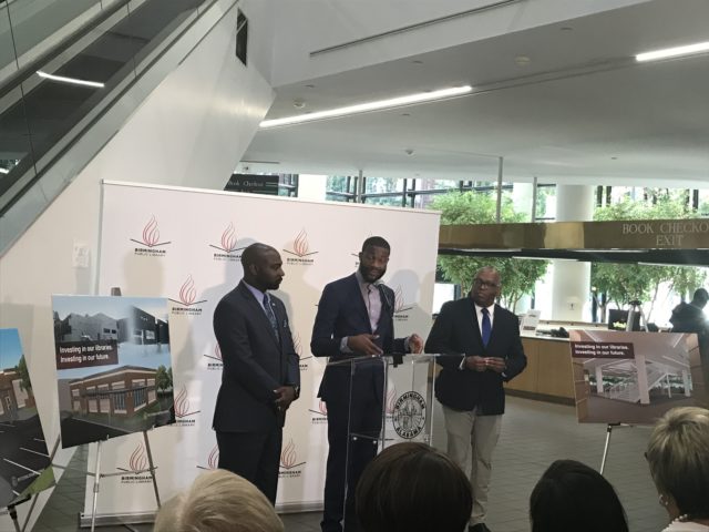 Mayor Randall Woodfin (center) joined by James Sullivan (left), president of the Library Board of Trustees and Floyd Council (right), executive director of the library, announcing the replacement of the inoperable escalators with a new staircase at the Central Library. (Photo by: Erica Wright | The Birmingham Times)