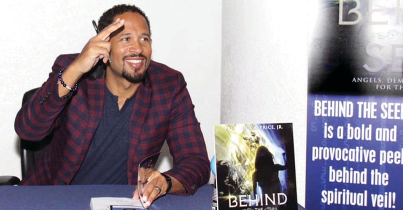 Pastor Frederick Price Jr. signed hundreds of books at the reception. (Photo by: Richard Ventura | CCC)