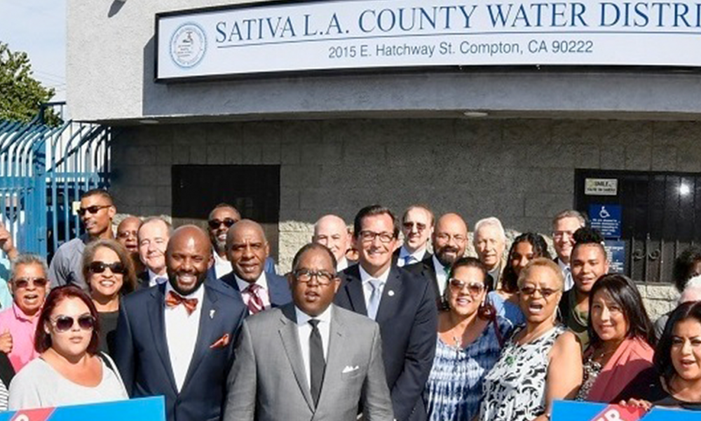 County Supervisor Mark Ridley-Thomas (Center) at the Sativa Water District Headquarters. (Photo by: wavenewspapers.com)