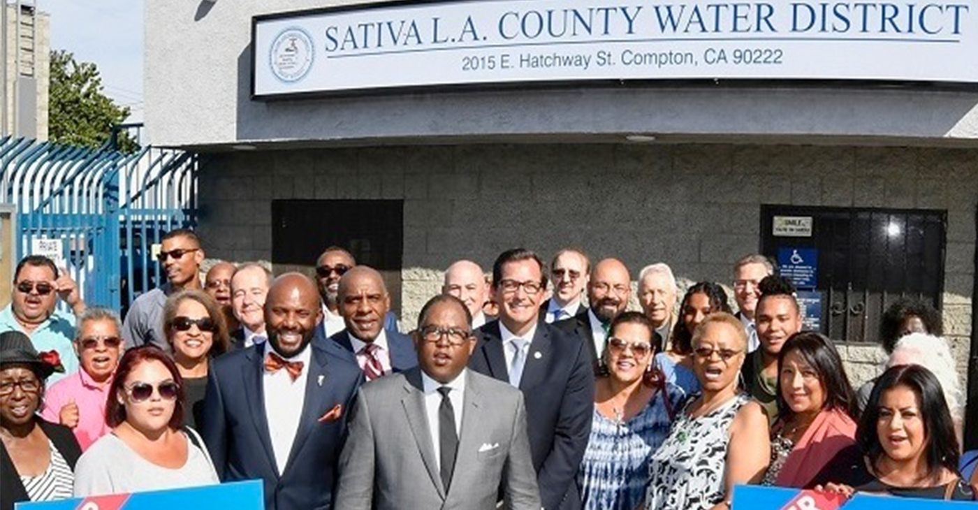 County Supervisor Mark Ridley-Thomas (Center) at the Sativa Water District Headquarters. (Photo by: wavenewspapers.com)