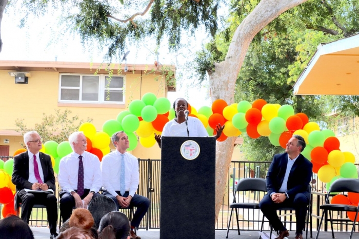 Julie Legardye shares her testimony among neighbors and friends of Nickerson Gardens (Courtesy Housing Authority of the City of Los Angeles)