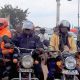 Thousands of enterprising young Ugandan men make up the “Boda Boda Brigades,” that transport people for money, dominate the crowded roadways of Kampala. (Photo credit: Sean Yoes)