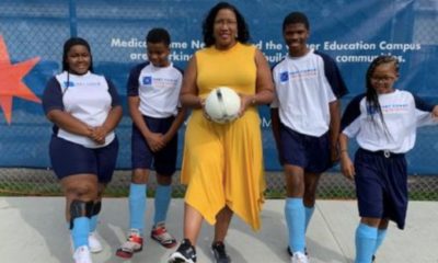 City Treasurer Melissa Conyears-Ervin (Center) with young soccer players. (Photo by: chicagodefender.com)