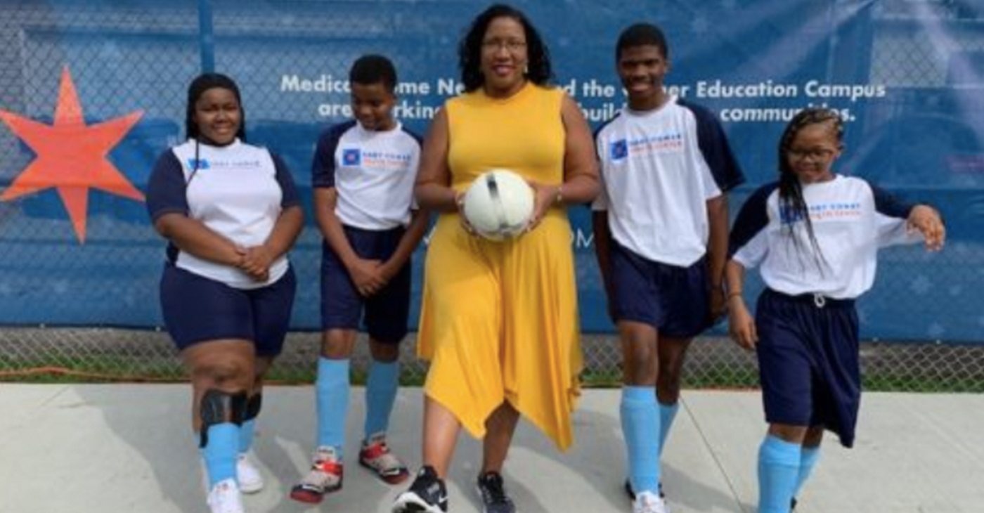 City Treasurer Melissa Conyears-Ervin (Center) with young soccer players. (Photo by: chicagodefender.com)