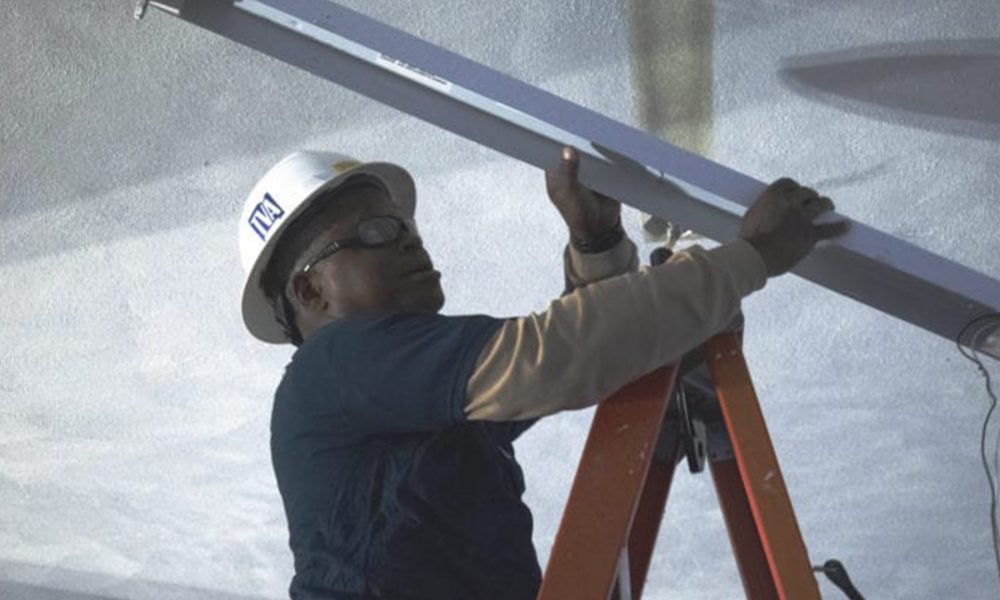 New lighting for locker rooms was on the wish list for Riverview K-8 School administrators and TVA associates put in the work to make that happen this past Monday. (Photo by: Karanja A. Ajanaku)