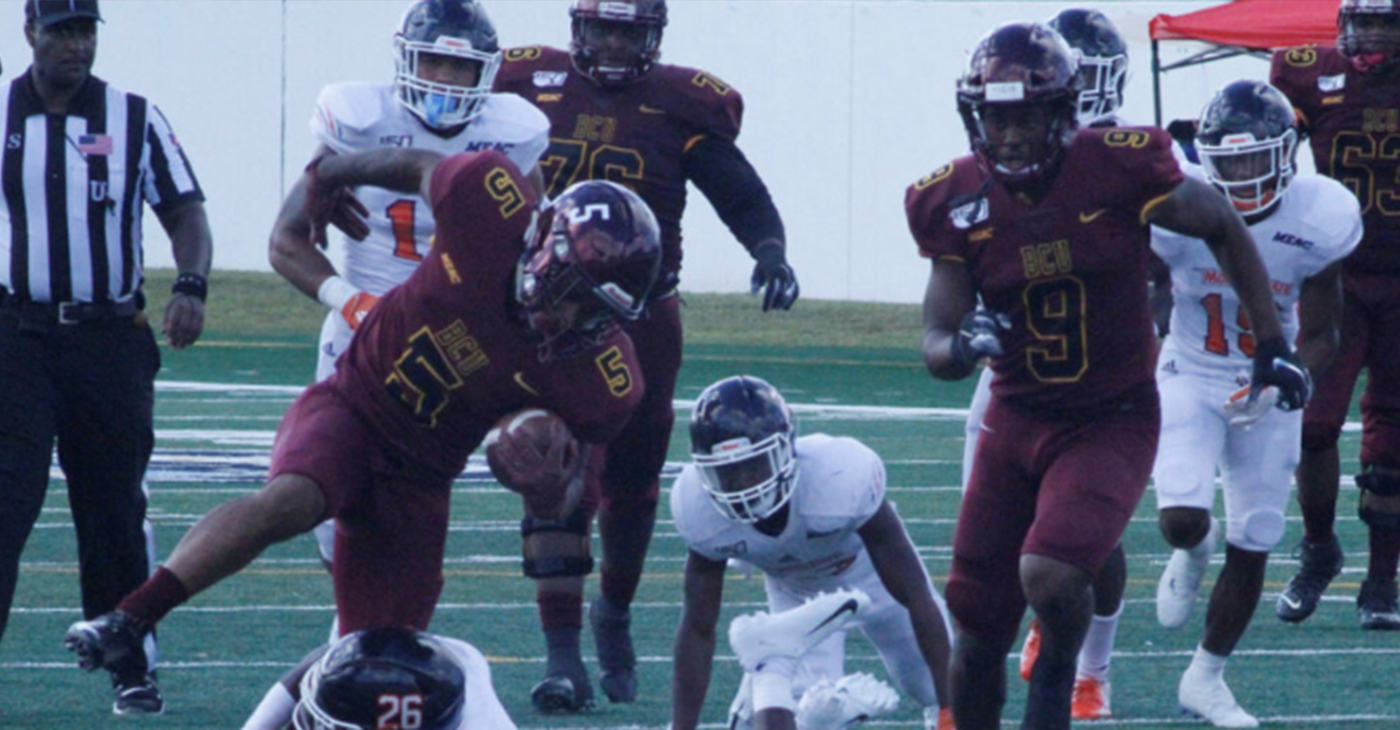Bethune Cookman’s Akevious Williams drops back to pass while leading the Wildcats’ offense against the Morgan State Bears’ defense. B-CU defeated Morgan State 31-20 at Daytona Stadium. (Photo by: Duane C. Fernandez Sr. | Florida Courier)