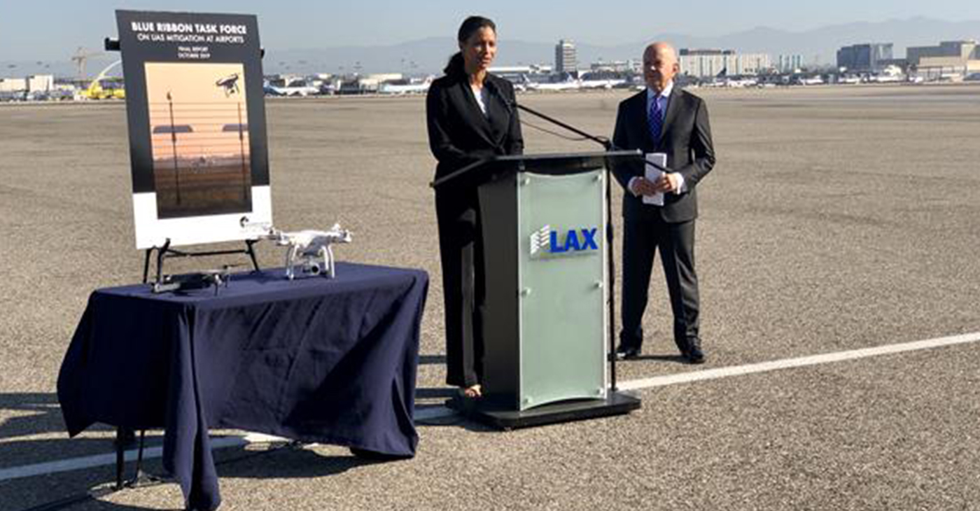 LAWA Chief Executive Officer Deborah Flint (left) speaks alongside Michael Huerta, who served as Administrator of the Federal Aviation Administration from 2011-2018, at a press event at Los Angeles International Airport.