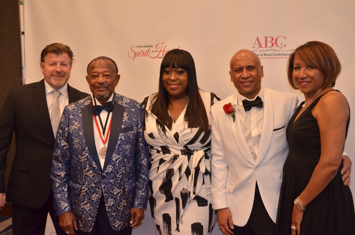 ABC founder Richard Allen Williams, MD (second to left) poses with Loni Love (center) and former ABC board chair Robert Gillespie MD (second to right) (Photo by: Amanda Scurlock | L.A. Sentinel)