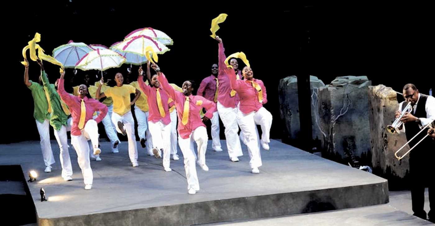 Latanya d. Tigner leads members of Dimensions Dance Theater. (Photo by: Jay Yamada).